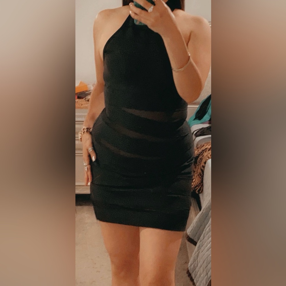 Black dress. Mini dress, halter. Back zipper